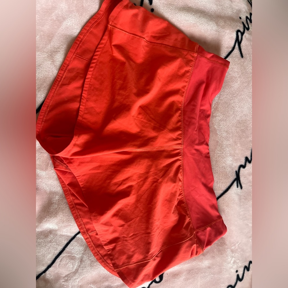 red lululemon shorts